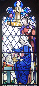 The Holy Family detail from the north aisle window February 2010